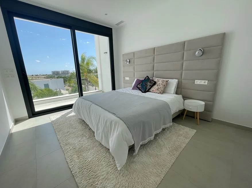 Rose Quartz bedroom with grey and white decor